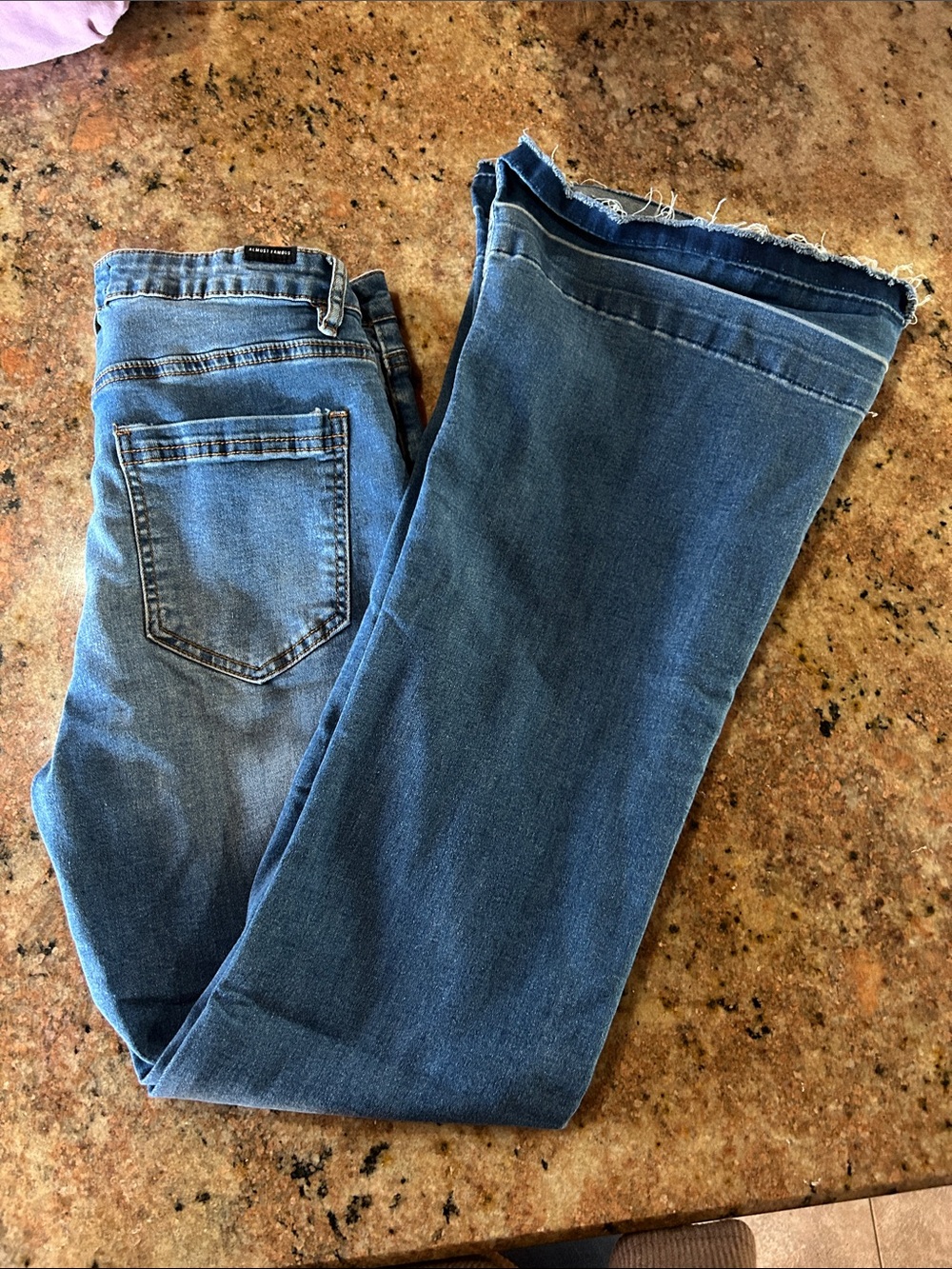 Almost Famous Women's Blue Ankle Crop Jeans with Raw Frayed Hem